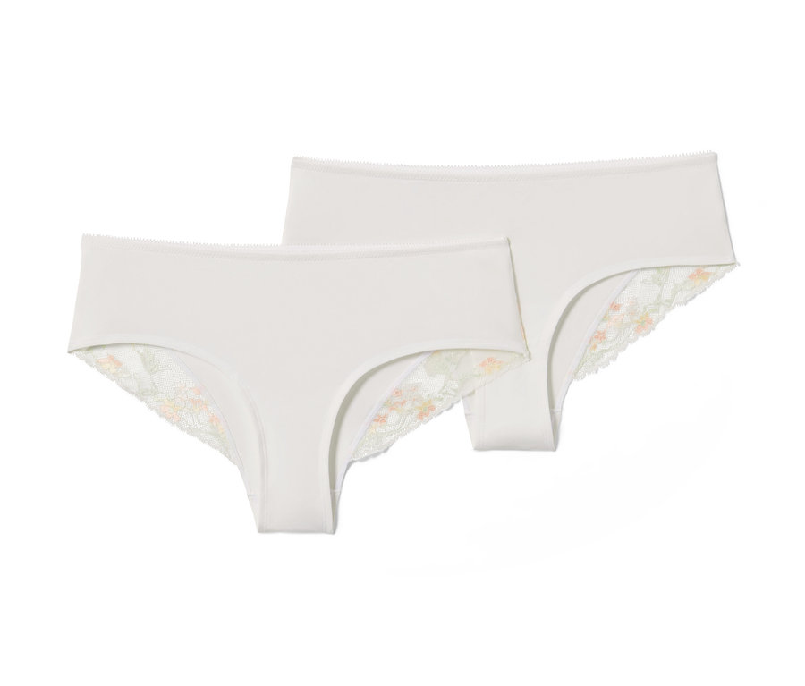 Dvoje biele bokové nohavičky.