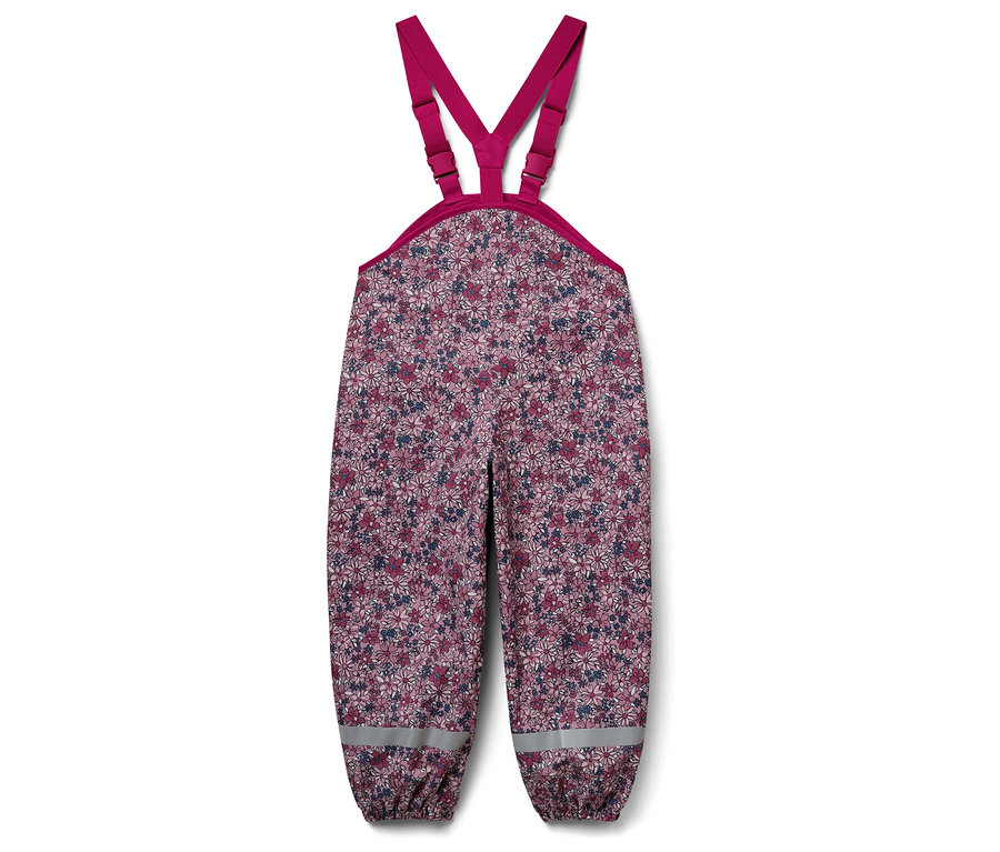 Detské nohavice s náprsenkou s kvetinovou potlačou.