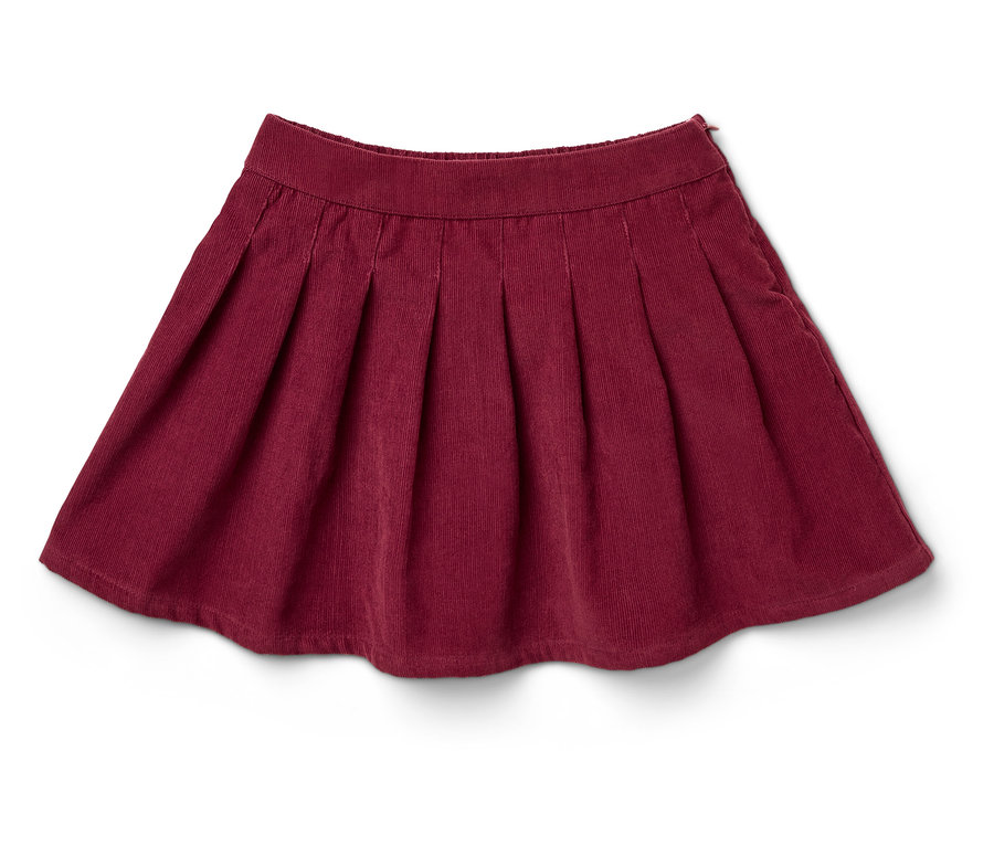 Vínová plisovaná sukňa z menčestru leží na bielom pozadí.