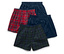 Štyri pánske boxerky s elastickým pásom: dvoje modré, jedny červené kockované a jedny zelené kockované.