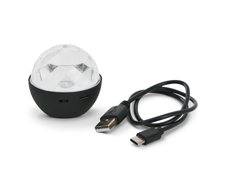 Miniatúrna diskoguľa s čiernou základňou a USB káblom.