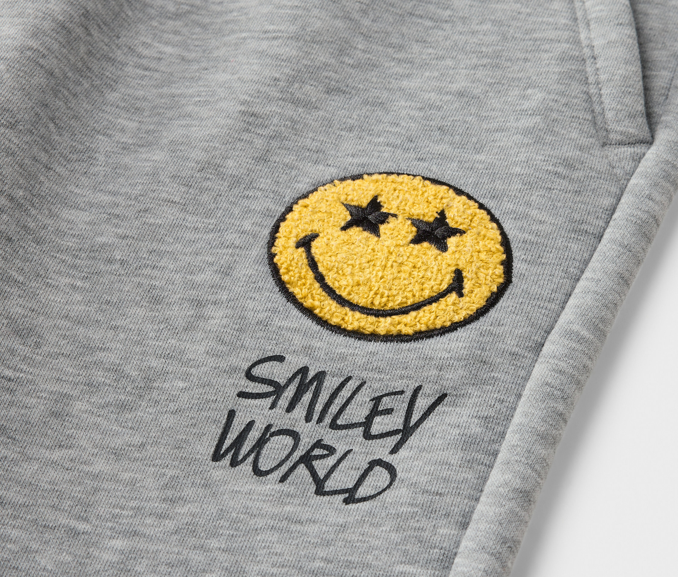 Tchibo - Detské teplákové nohavice Smileyworld®