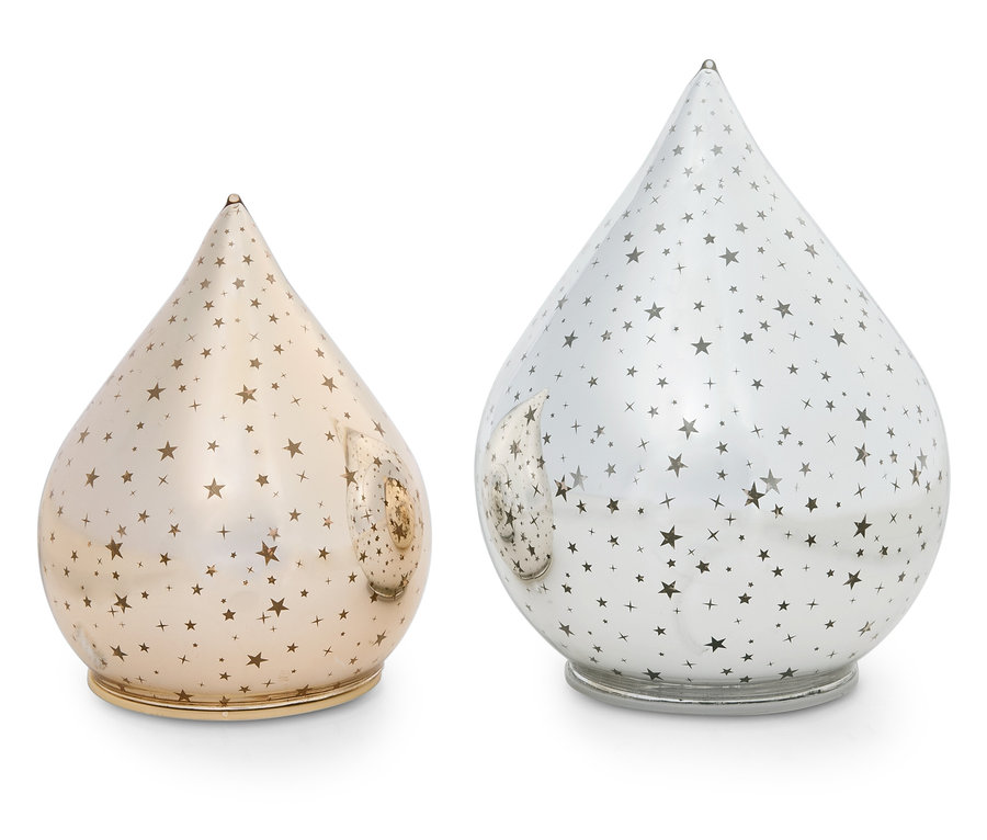 Dva dekoračné predmety v tvare kvapky, jeden zlatý a jeden strieborný, oba so vzorom hviezd.