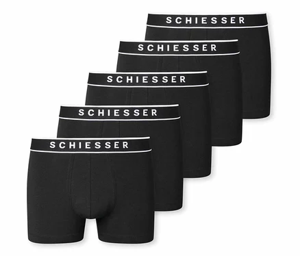 Päť čiernych šortiek SCHIESSER s bielym pásom s nápisom značky.