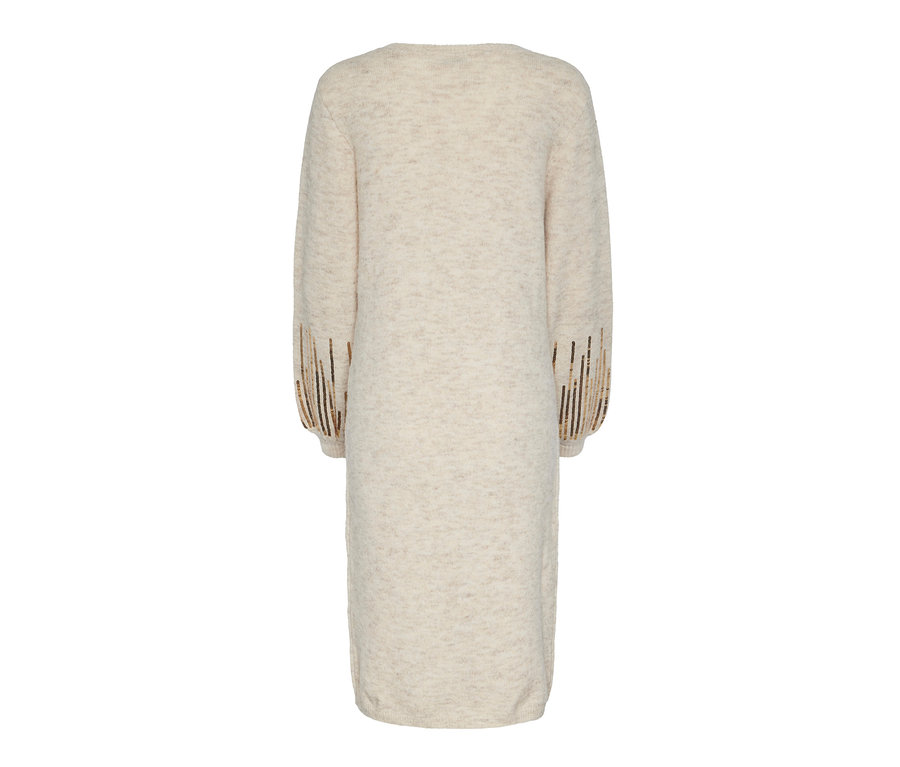 Úpletové šaty s flitrami, béžové, zobrazené zozadu.