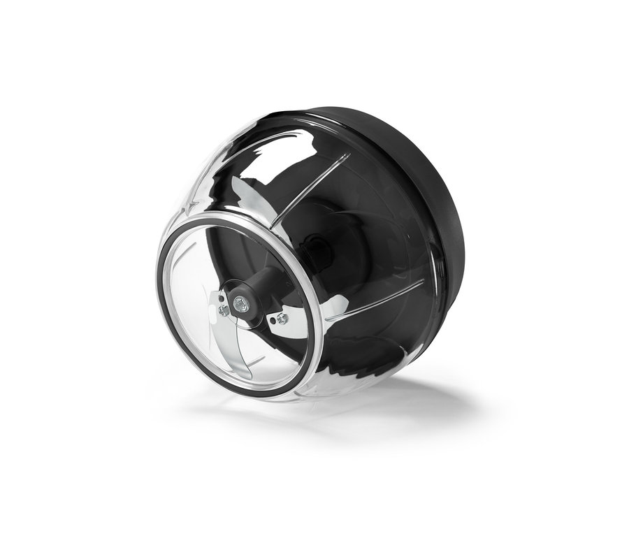 Detailný záber na manuálny multikrájač s priehľadnou nádobou a nerezovými nožmi.