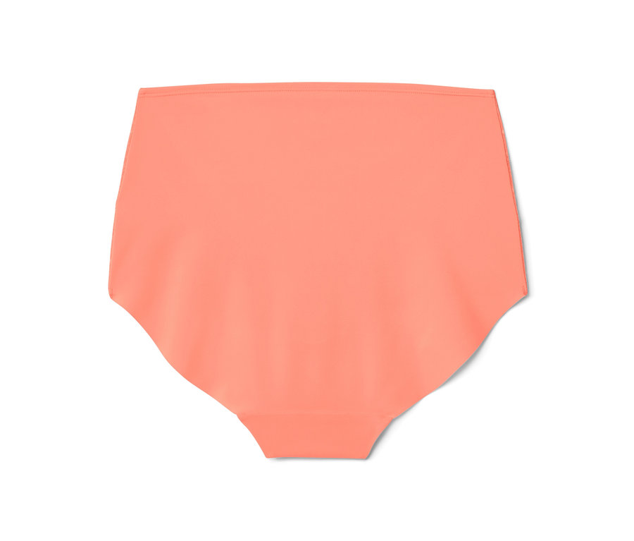 Detailný záber na nohavičky s vysokým pásom vo farbe papáje.