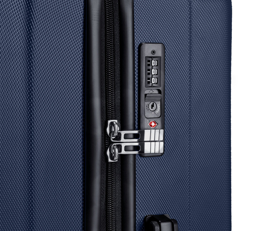 Detail veľkého kufra zo súpravy škrupinových kufrov.