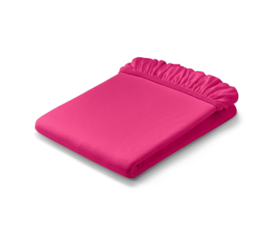 Zložená ružová džersejová napínacia plachta štandardnej veľkosti a džersejová napínacia plachta dvojlôžko.