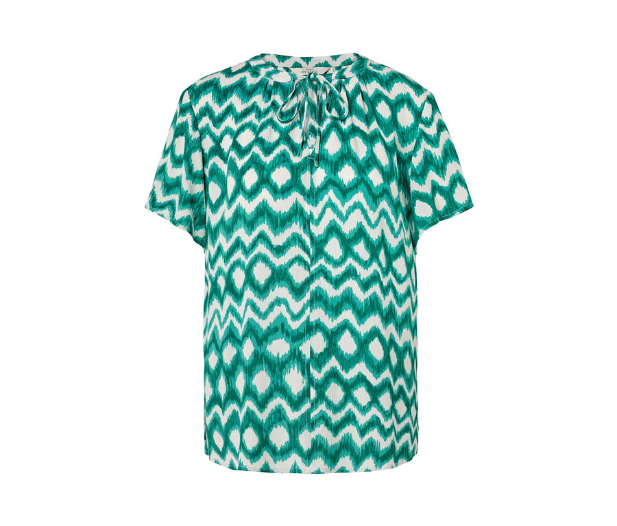 Biela tuniková blúzka so zeleným vzorom.