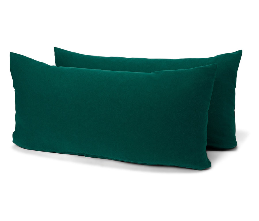 Dva smaragdovo zelené obdĺžnikové vankúše na bielom pozadí.