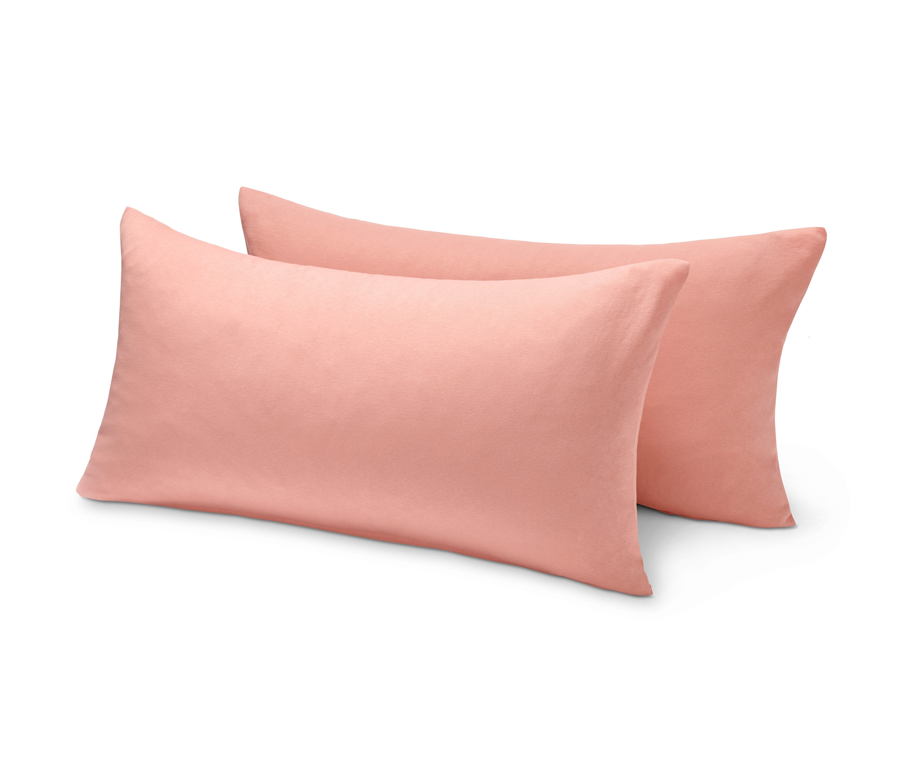 Dve marhuľové džersejové obliečky na vankúše, každá cca 80 x 40 cm.