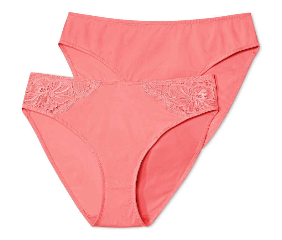 Dvoje nohavičiek v papájovej farbe.