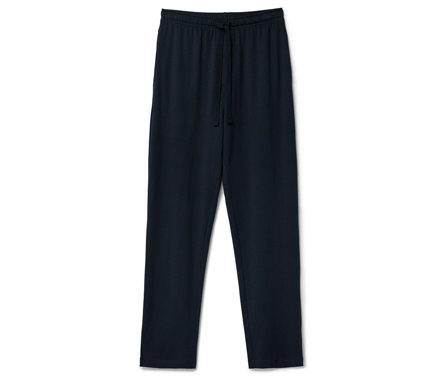 Tmavo modré tepláky so sťahovacou šnúrkou v páse ležia na bielom pozadí.