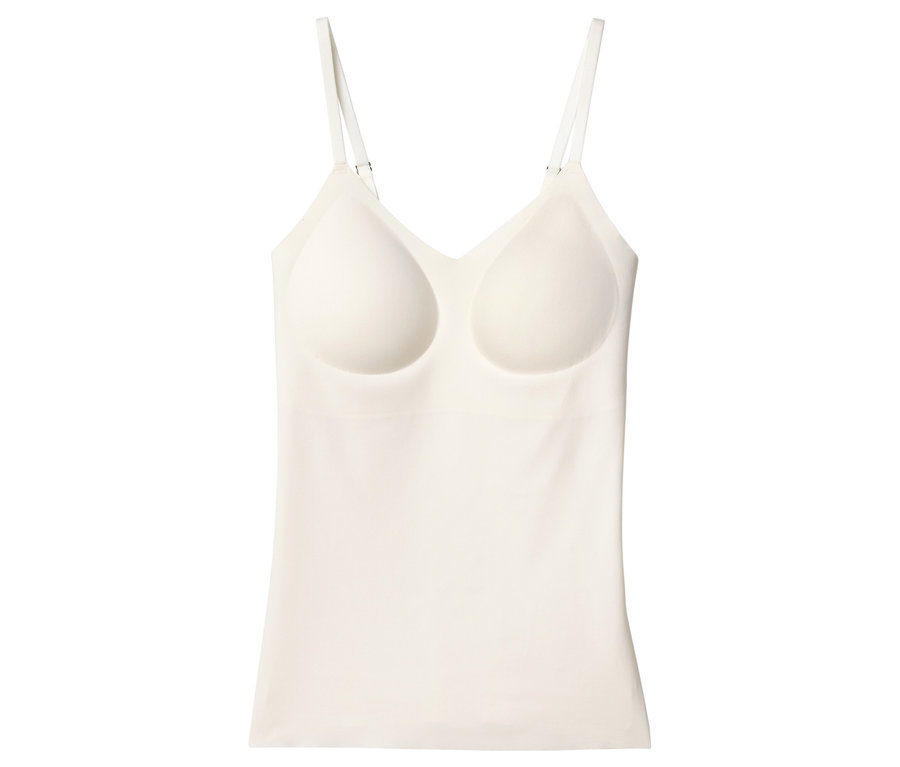 Tielko v slonovinovej farbe s integrovanou podprsenkou a tenkými ramienkami.