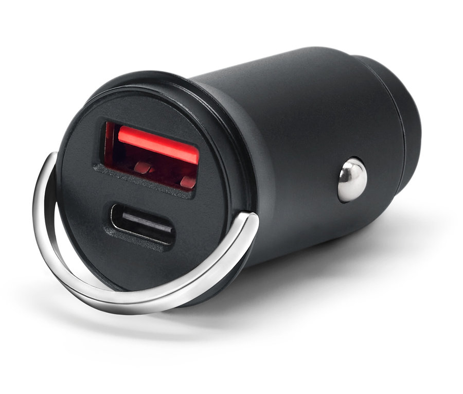 Čierna USB nabíjačka s dvoma portami a strieborným krúžkom na bielom pozadí.