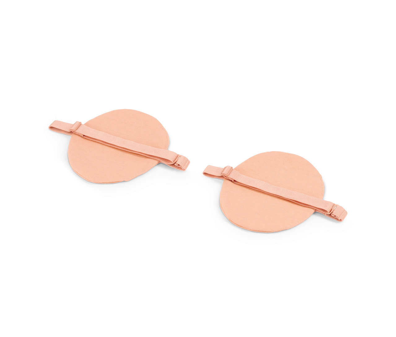 Dva páry béžových vložiek do podpazušia.