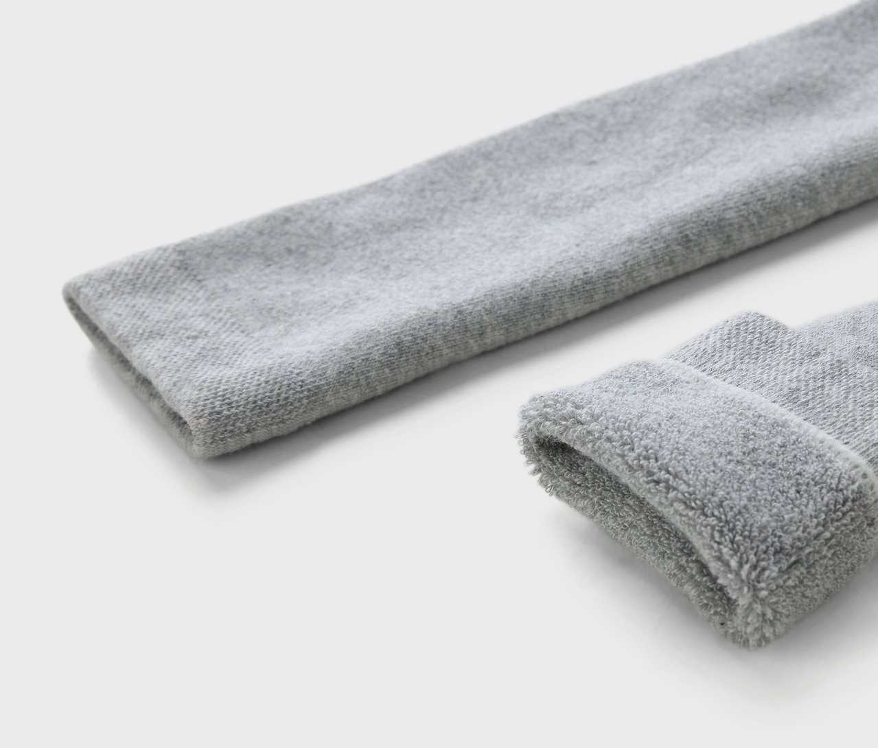 Detail troch detských termo legín v hnedej, sivej a modrej farbe.