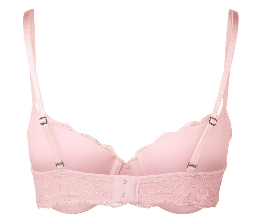 Detail ružovej čipkovanej podprsenky s nastaviteľnými ramienkami.