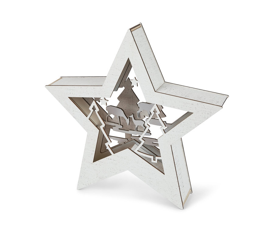 Detailný záber na biely LED obrázok v tvare hviezdy s výrezom lesnej scény.