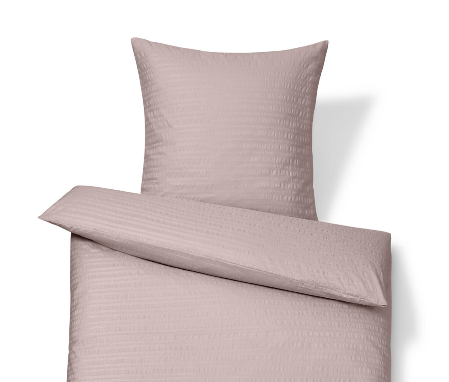 Ružové krepové posteľné obliečky štandardnej a nadmernej veľkosti.