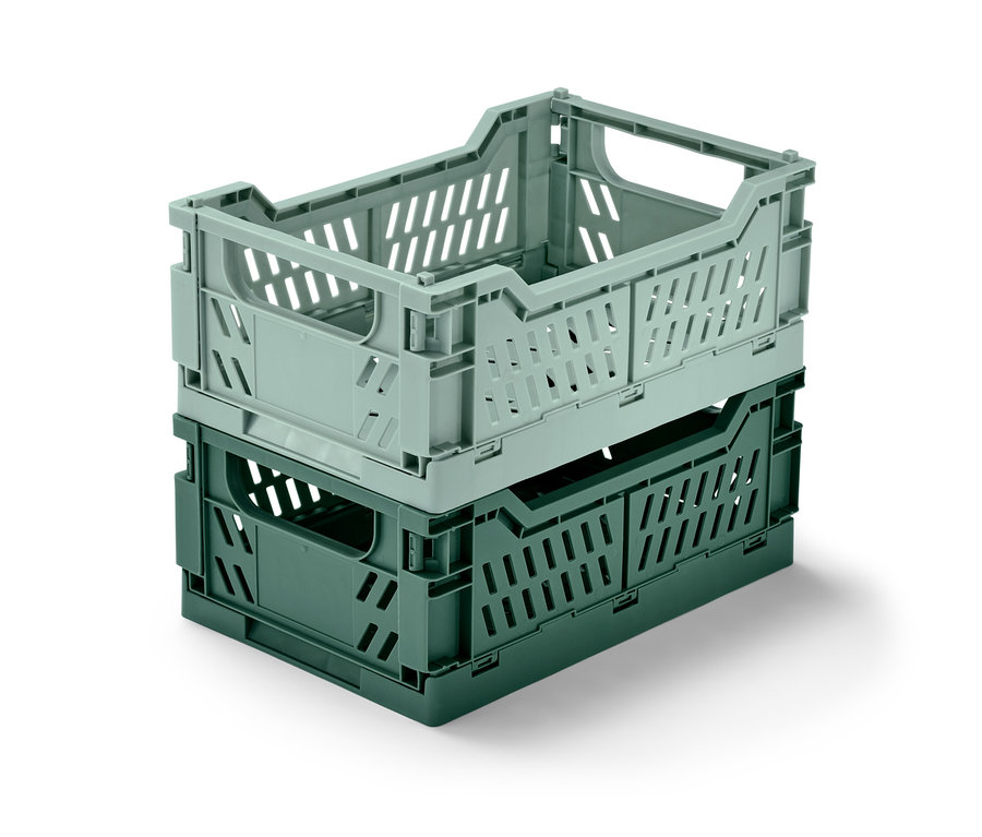 Dve sklápacie úložné debničky naskladané na sebe.