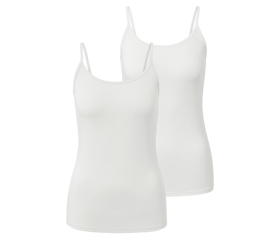 Dve biele tielka so špagetovými ramienkami ležia na sebe.