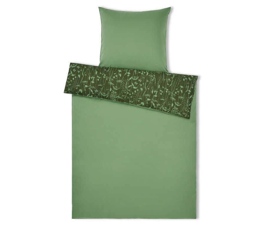 Zelené obliečky s kvetinovým vzorom a vankúš hore.