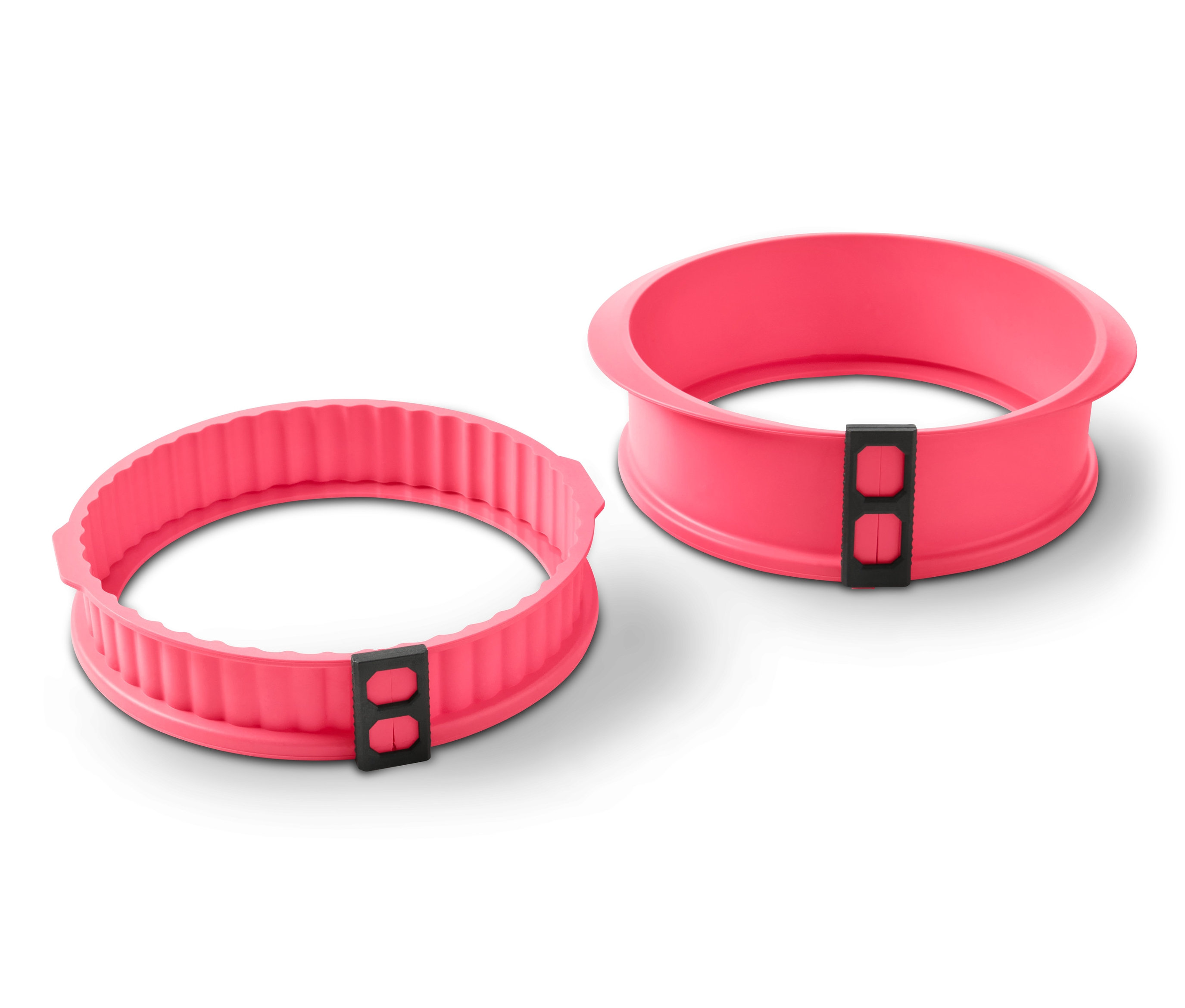 Dve ružové formy na pečenie "Forma na tortu a tarte 2 v 1" ležia na bielom pozadí.