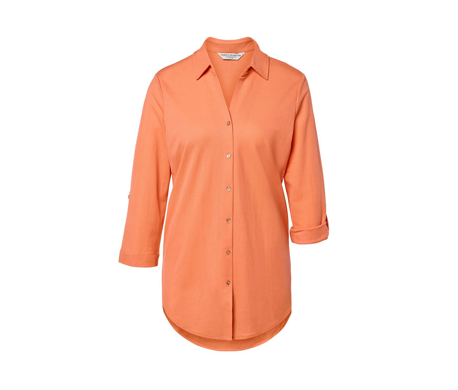 Broskyňová džersejová piké blúzka s trojštvrťovými rukávmi.