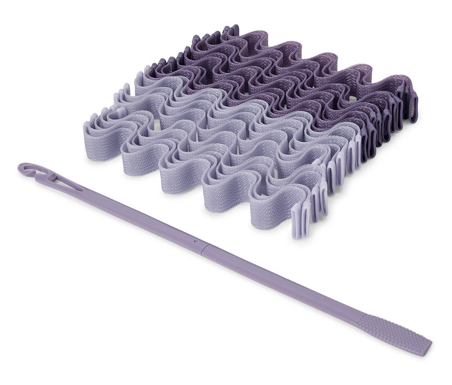 Sada fialových natáčok na vlasy a aplikátor.