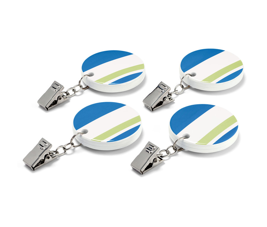 Štyri závažia na obrus s modrými a zelenými pruhmi.