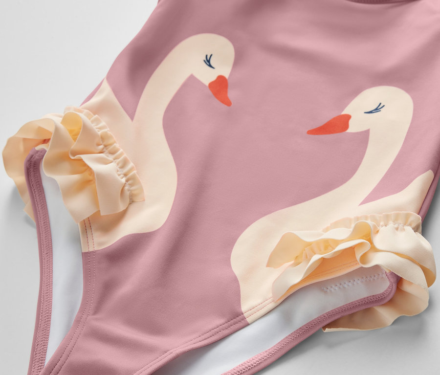 Ružové detské plavky s volánikmi a potlačou labutí.