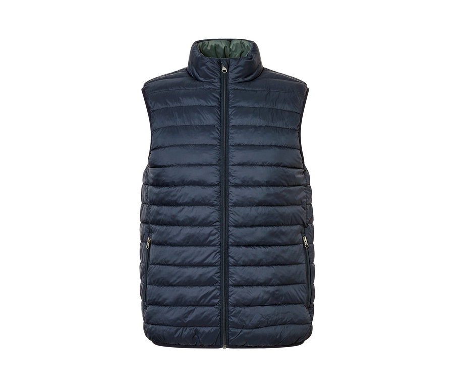 Tmavomodrá obojstranná vesta so zipsom uprostred.
