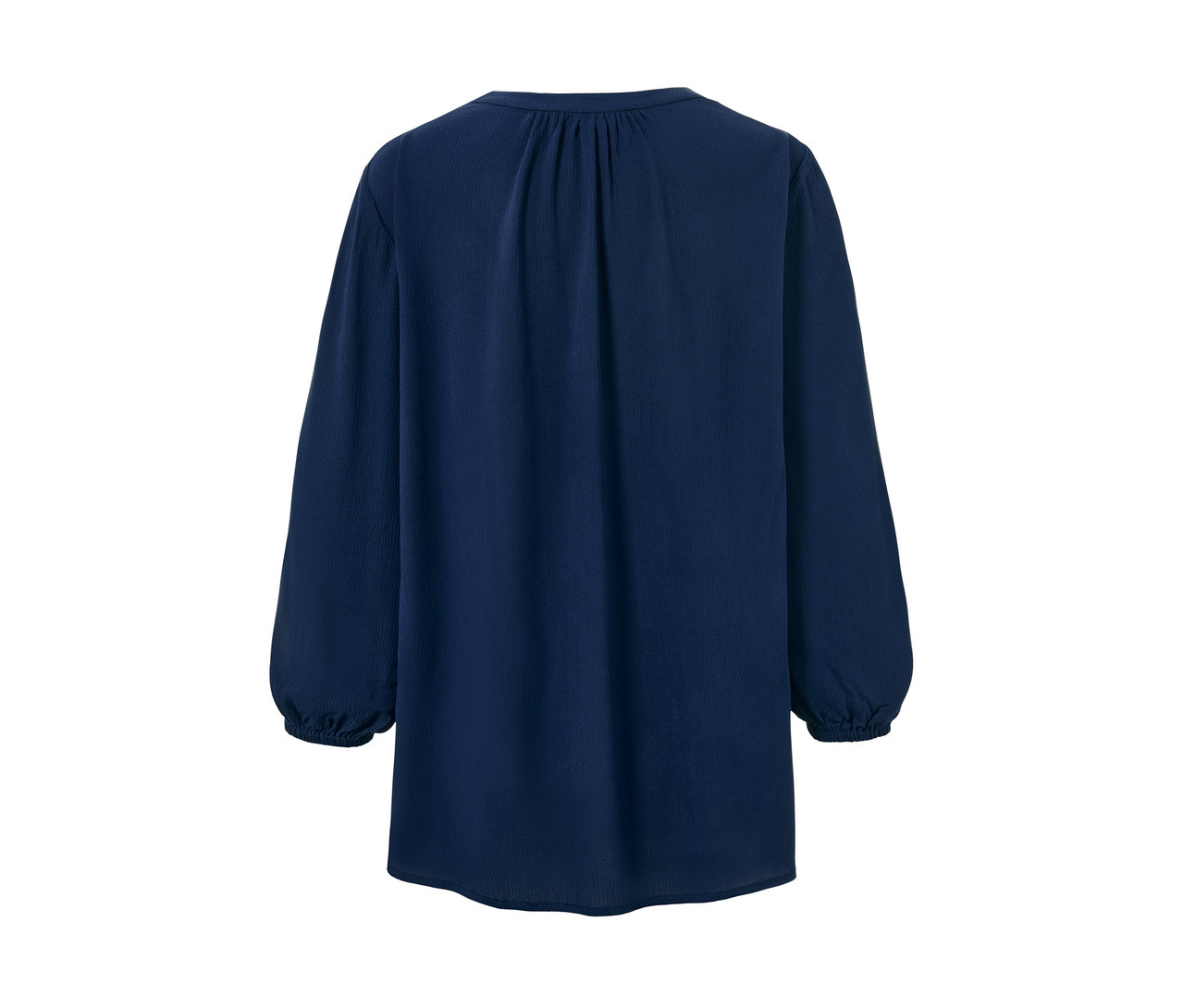 Modrá tuniková blúzka s dlhými rukávmi.