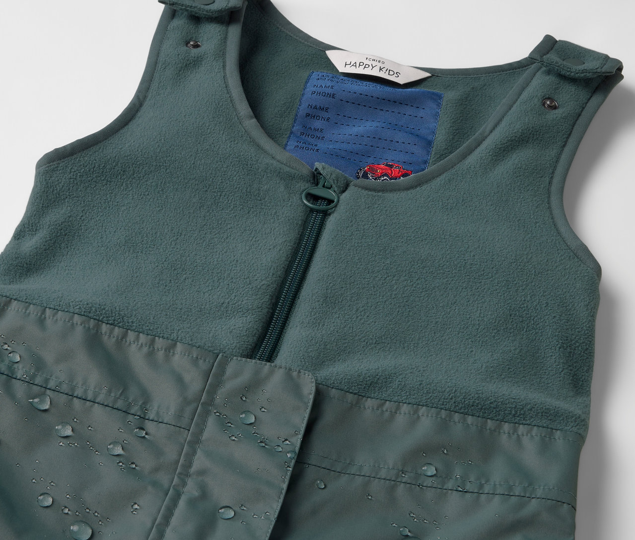 Detailný záber na zelené detské termo nohavice do dažďa.