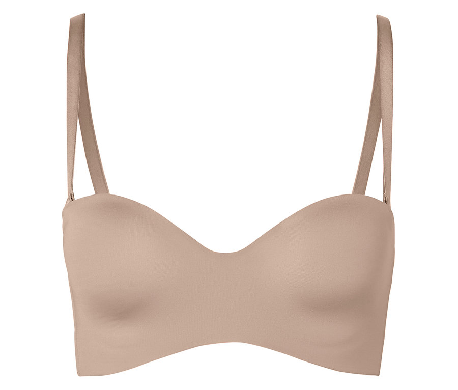 Telový podprsenka bez ramienok s ramienkami leží na bielom pozadí.