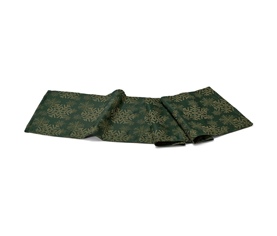 Zelený žakárový behúň na stôl so vzorom snehových vločiek.