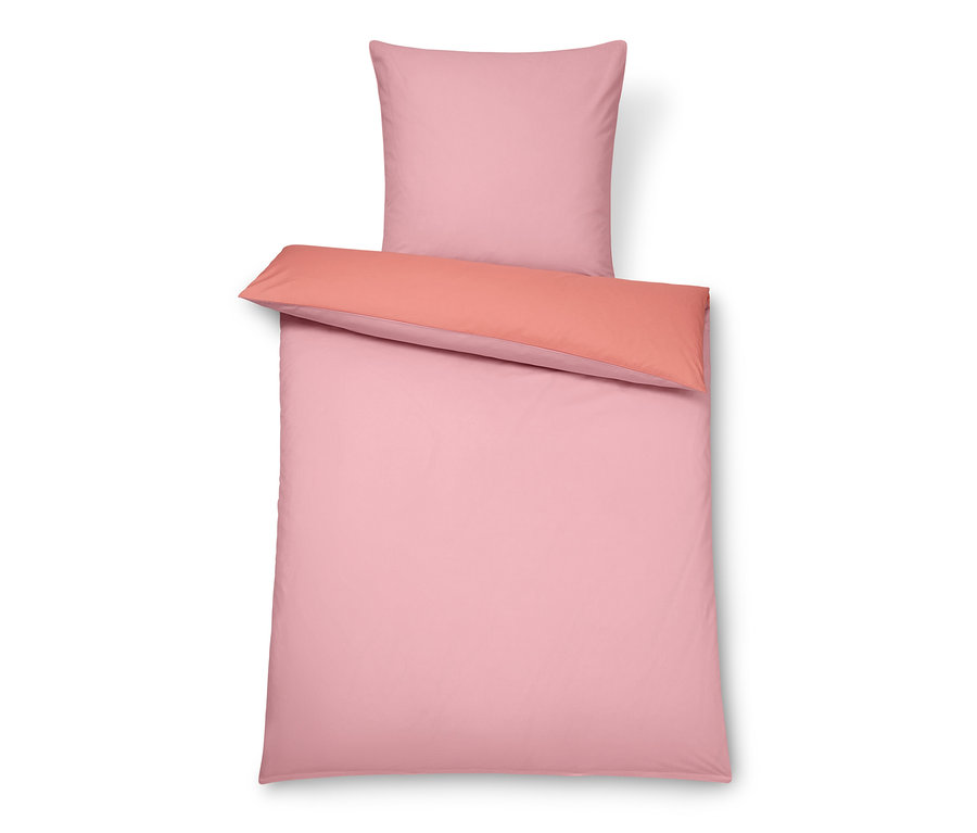 Ružové prémiové bavlnené obliečky štandardnej veľkosti s koralovým lemom a vankúšom.