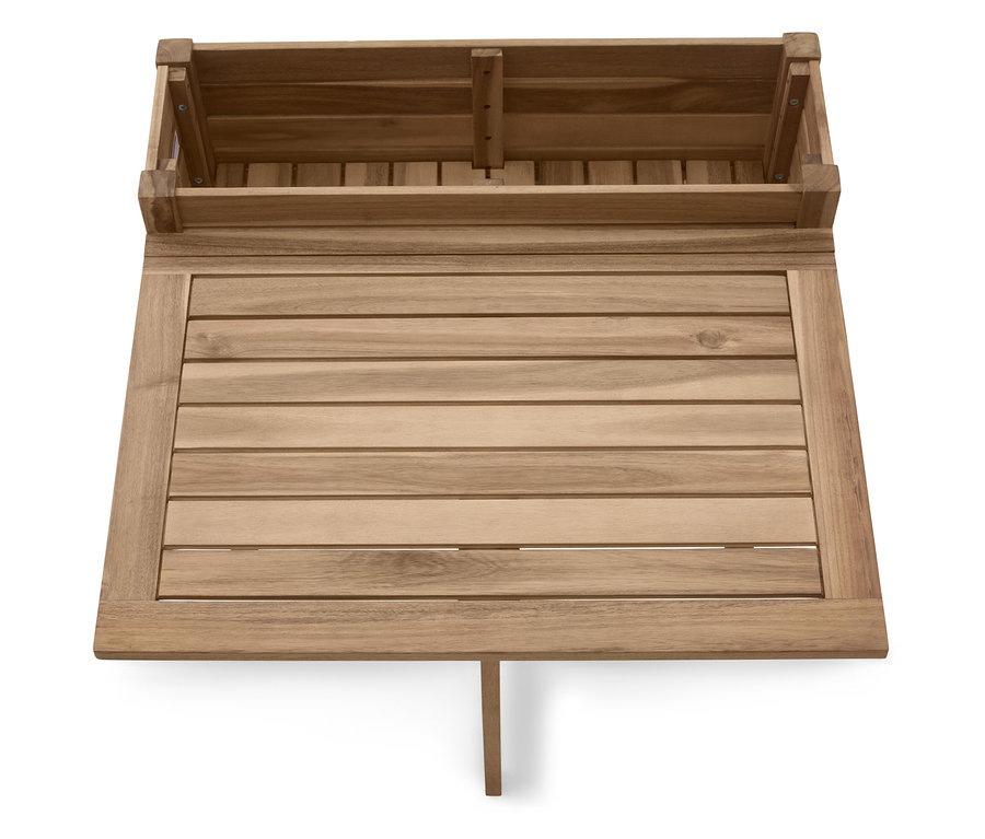 Pohľad zhora na obdĺžnikový drevený stôl s dreveným úložným boxom na zadnej strane, stôl má jednu podperu.