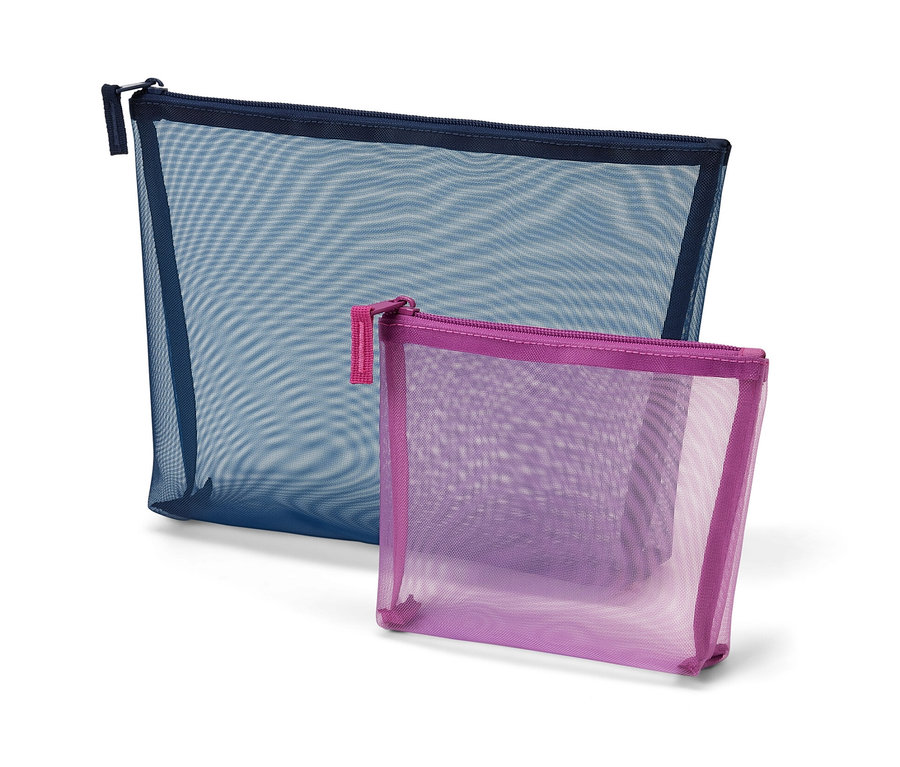 Dve skladovacie taštičky, jedna tmavomodrá a jedna fialová.