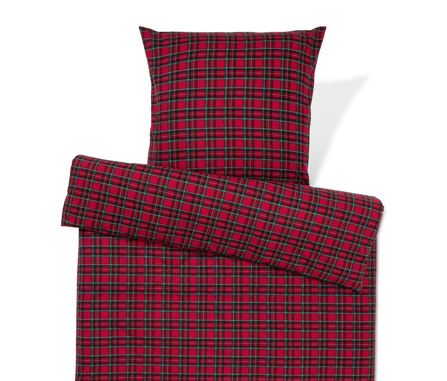 Červené kárované obliečky s vankúšom.