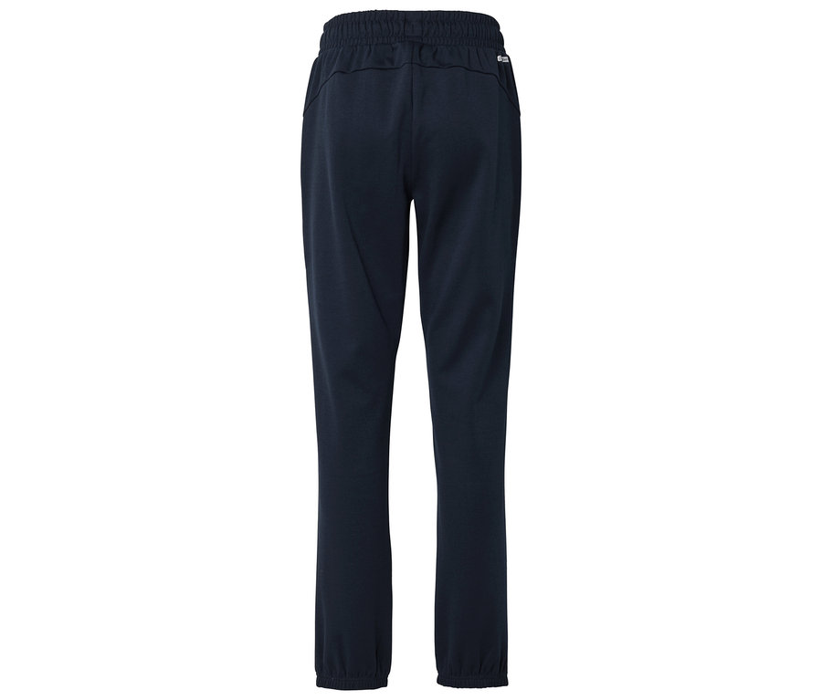 Tmavomodré tepláky s elastickým pásom, fotené zozadu.