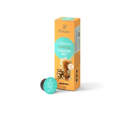 Oranžové balenie Cafissimo Flavoured Espresso Toasted Nut s 10 kapsulami a jedna samostatná kapsula vedľa.