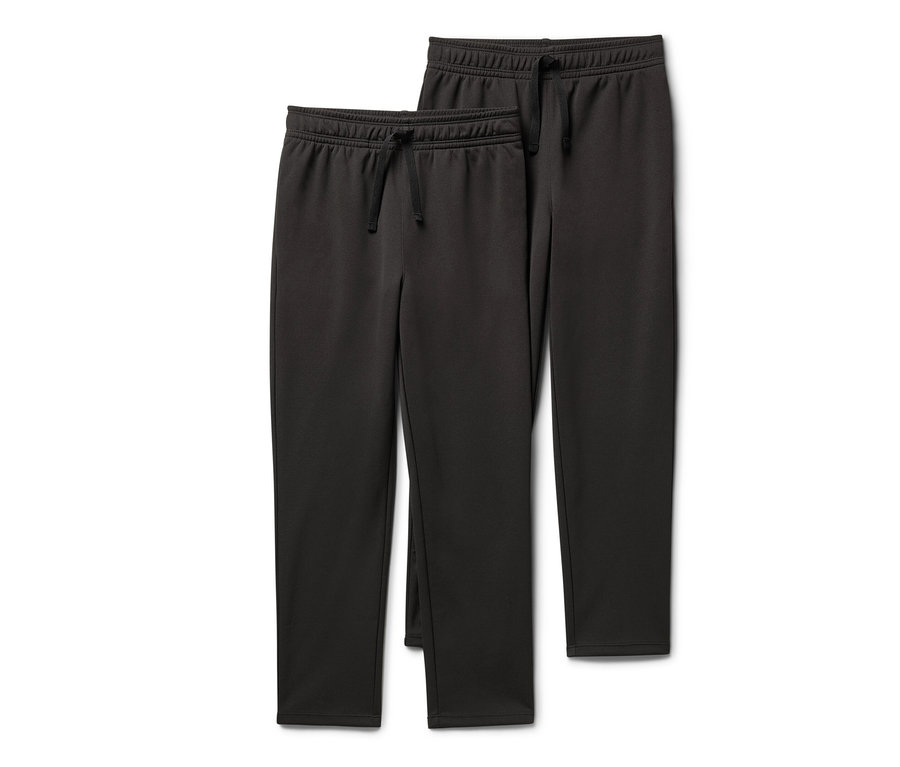 Dvoje detské športové nohavice.