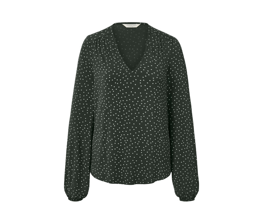 Zobrazené bodkované blúzkové tričko.