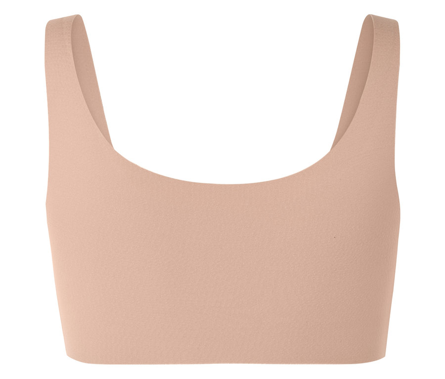 Broskyňový športový top so širokými ramienkami.