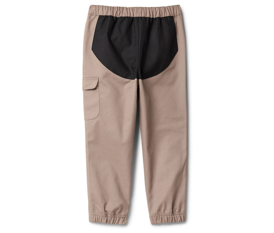 Béžové nohavice s elastickým pásom a čiernou vsadkou vzadu.