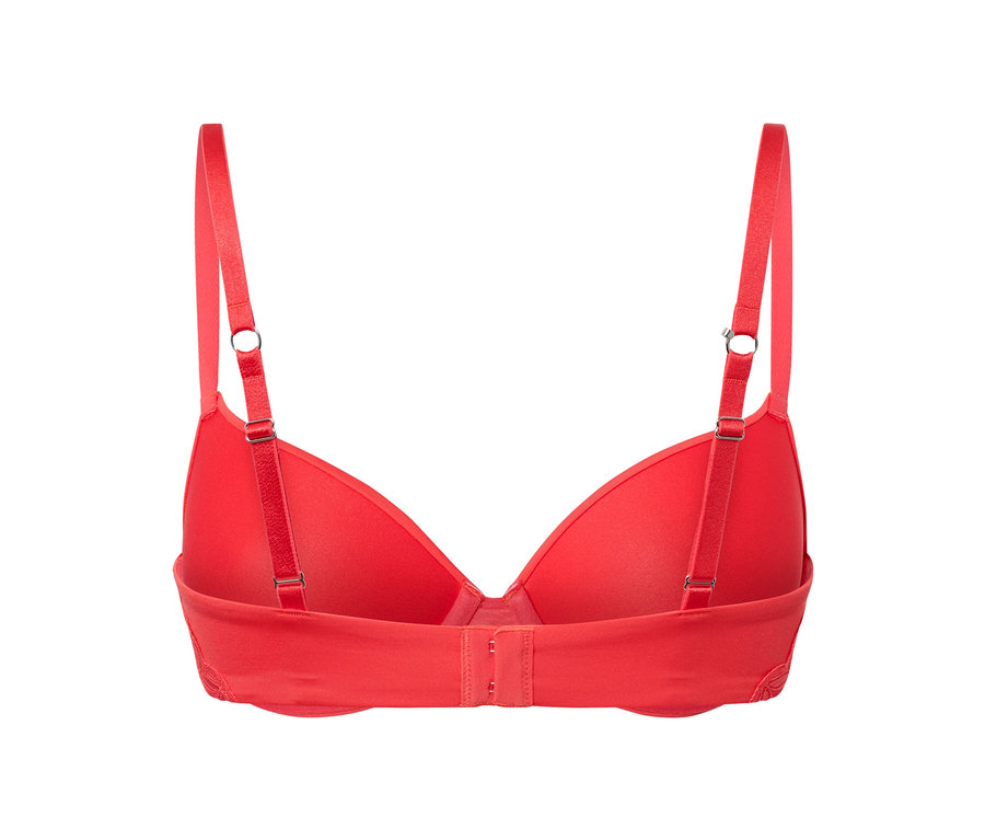 Detail zadnej strany koralovej podprsenky pod tričko.