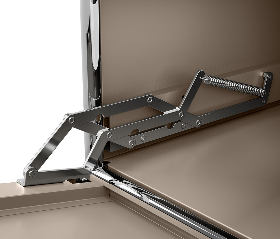 Detail sivohnedej kovovej komody CN3 s výklopnými priehradkami a mechanizmom otvárania.